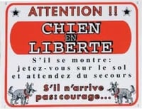 Cartello dissuasivo con scritta "Attenzione: cane in libertà"