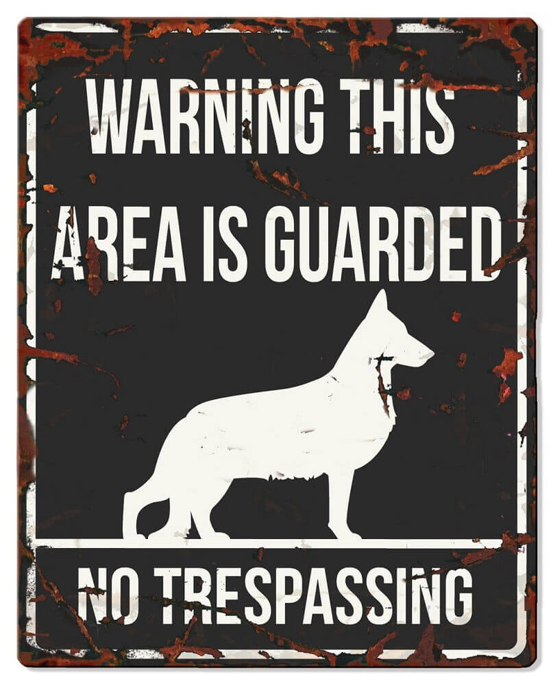 Schild WARNING mit Schäferhund