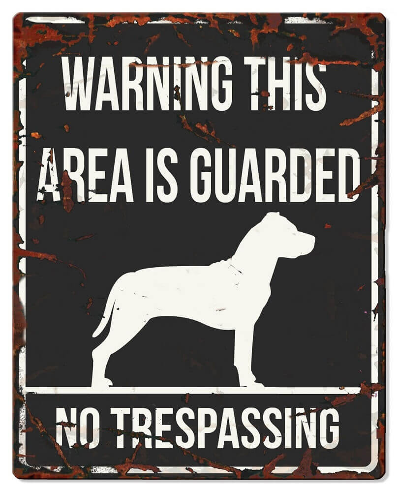 Schild WARNING mit Staffordshire Terrier